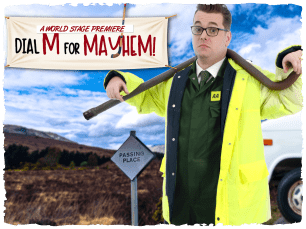 A man in an AA uniform and hi vis jacket. He has a metal  rod around his neck and is standing on the moors with a van behind. 